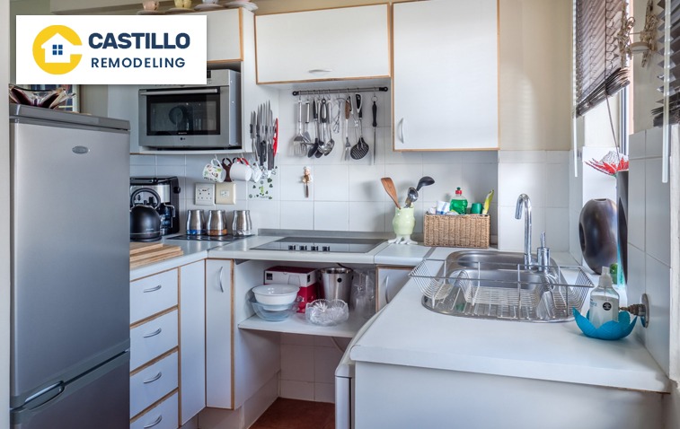 Compact kitchen featuring multi-functional furniture and hanging shelves